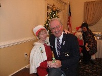 2011 NVSPS Holiday Party Cdr Kapers with Santa's helper (900x675, 126kb)
